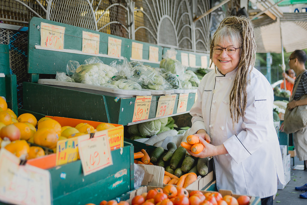 https://goodly.ca/wp-content/uploads/2020/12/019-Karen-with-Produce-Web.jpg