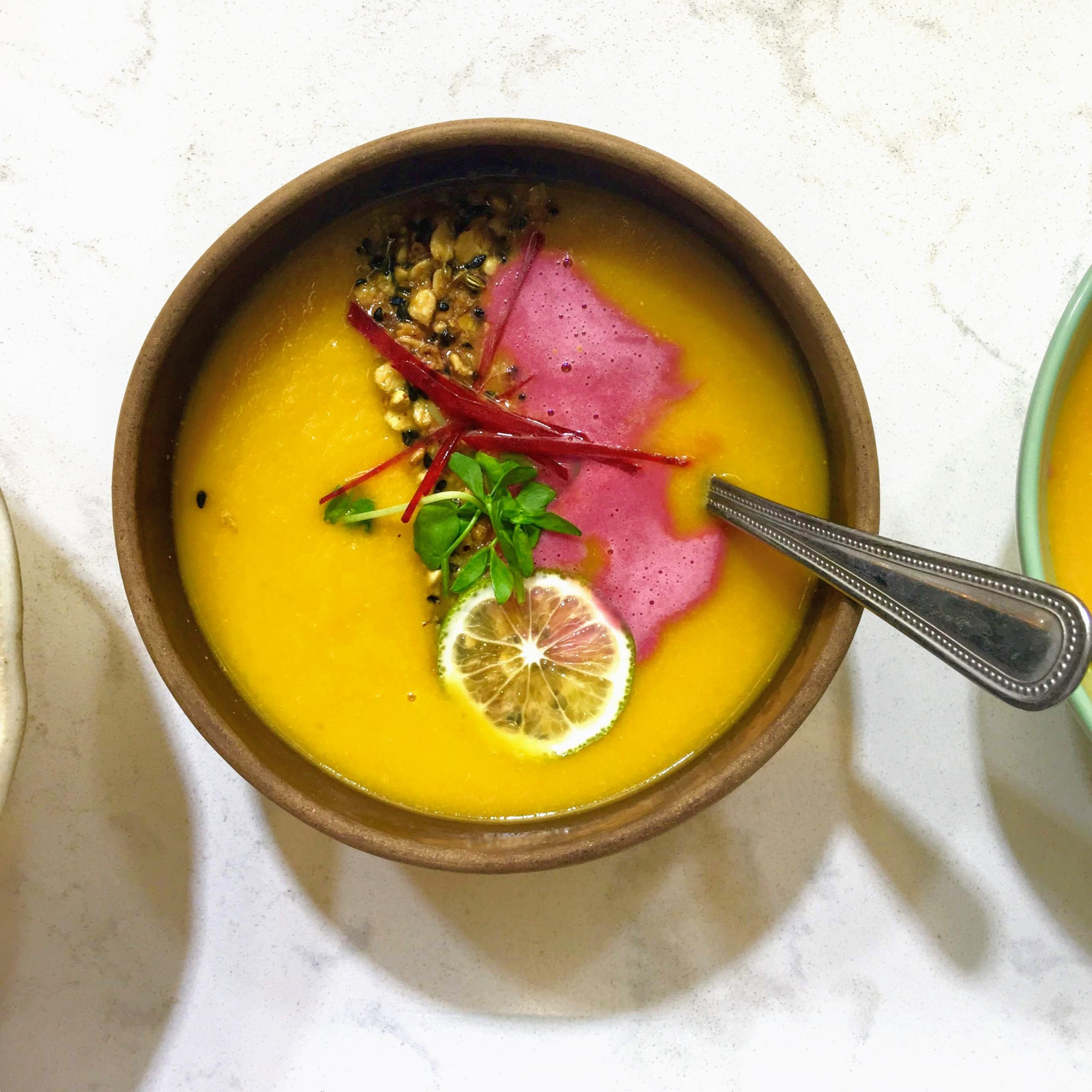 https://goodly.ca/wp-content/uploads/2020/12/Carrot-Pear-Soup-with-Dukkah-Granola-scaled.jpg